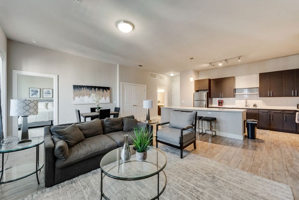 a living room with a couch and a table