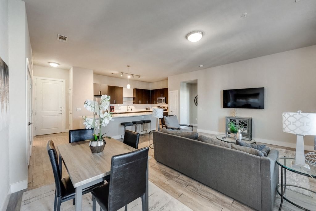 a living room with a couch and a table