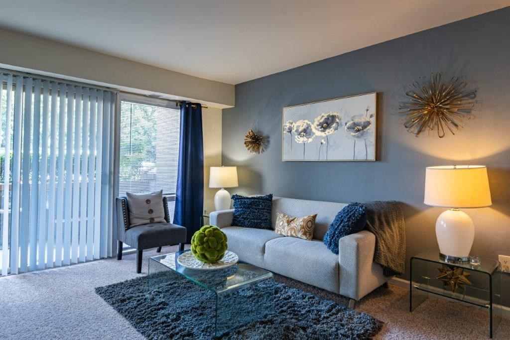 a living room with a couch and a table