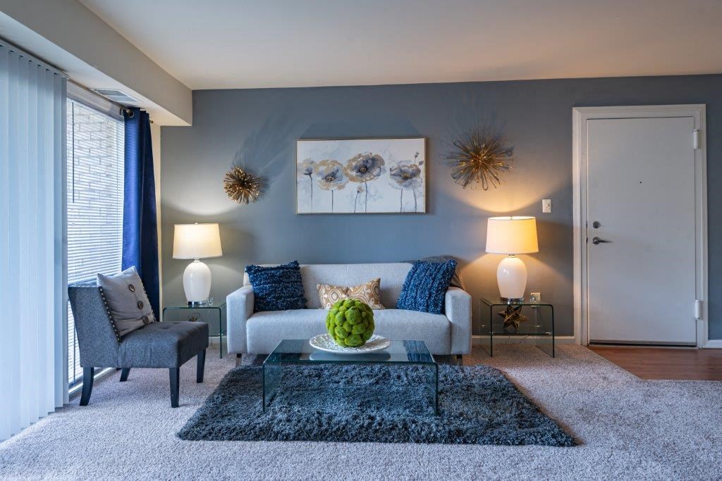 a living room with a couch and a table