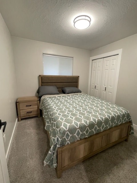 a bedroom with a bed and a closet