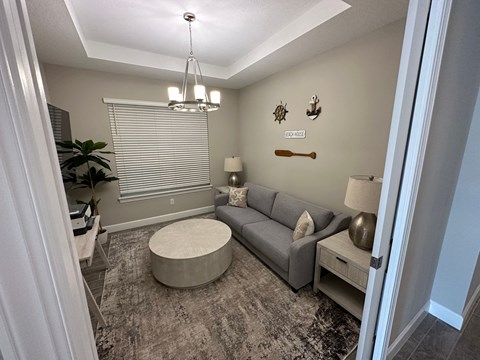 a living room with a couch and a table