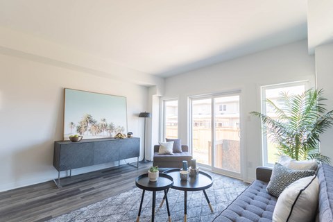 a living room with a couch and a table
