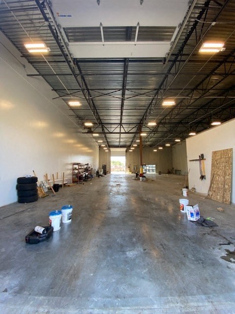a large empty warehouse with a lot of floors and ceilings