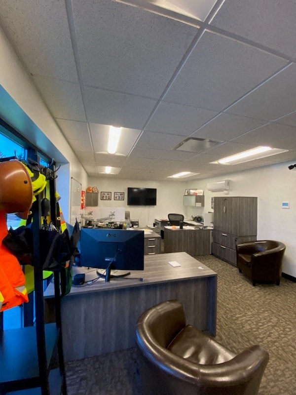 an office with a desk and a chair