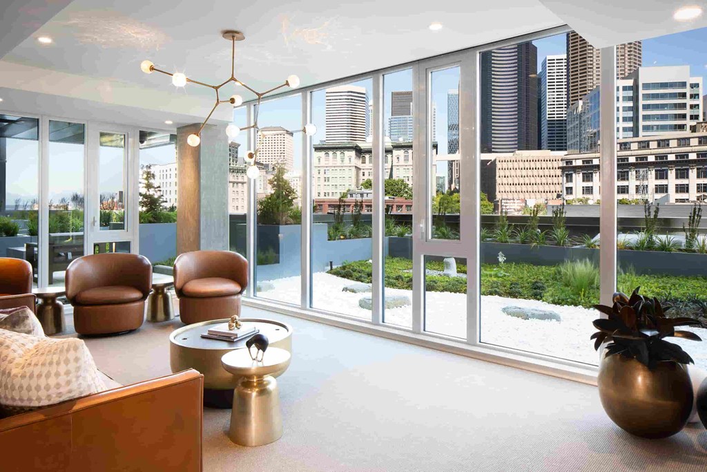 a living room with a view of the city