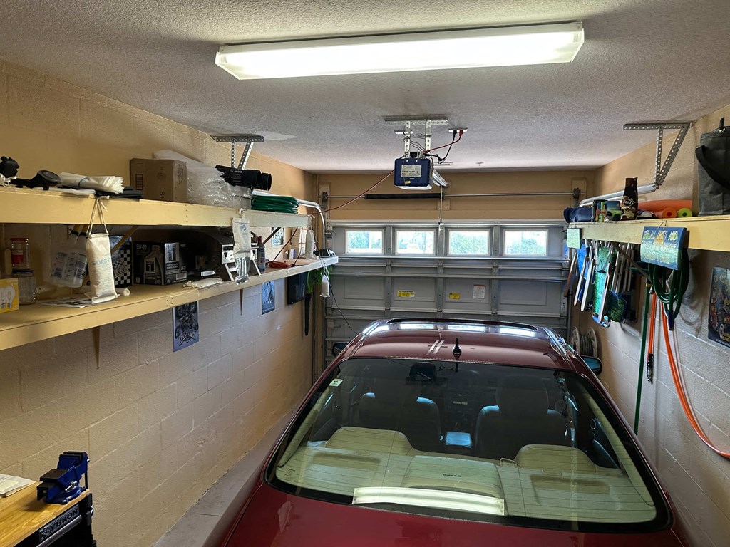 a car is parked in a garage with a window