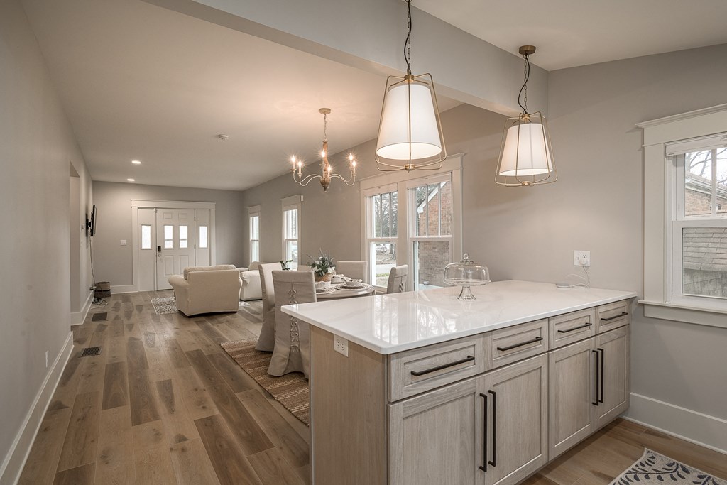 an open kitchen and living room in a new home