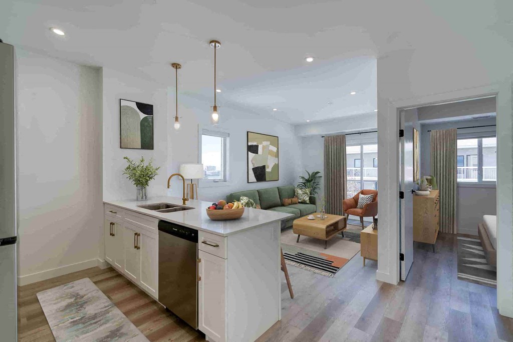 a kitchen and living room in an open floor plan