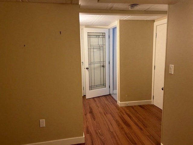 an empty room with a glass door in it