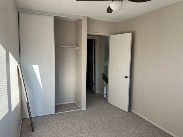 a room with a closet and a mirror in it