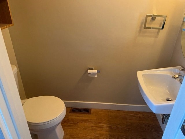 a small bathroom with a toilet and a sink