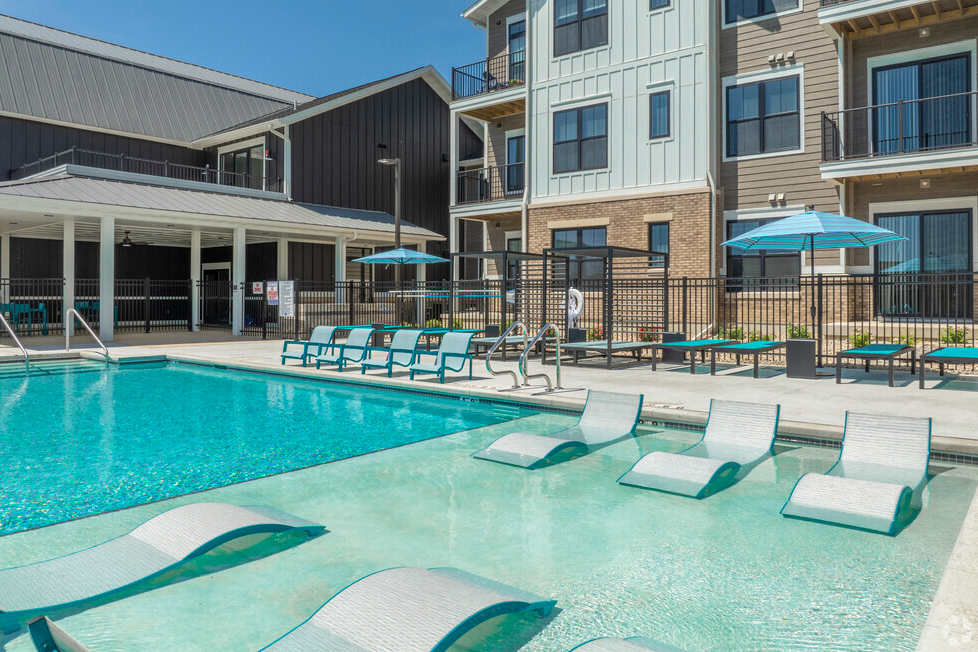 our apartments have a resort style pool with lounge chairs
