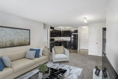 a living room with a couch and a chair