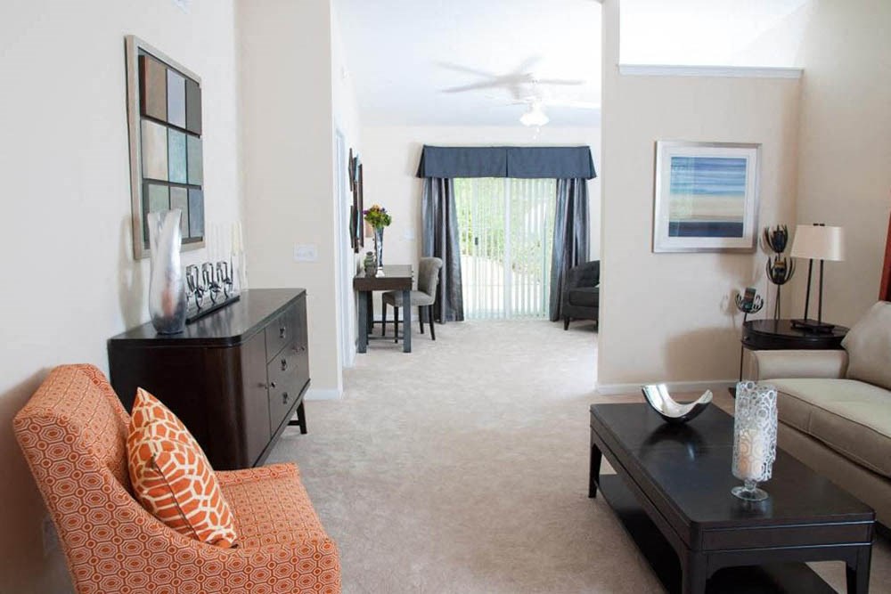 a living room with a couch and a table