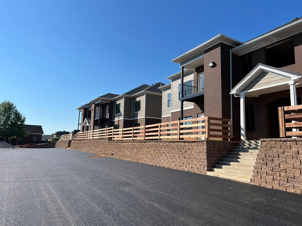 a row of houses on the side of a street