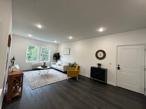 a living room with a couch and a table