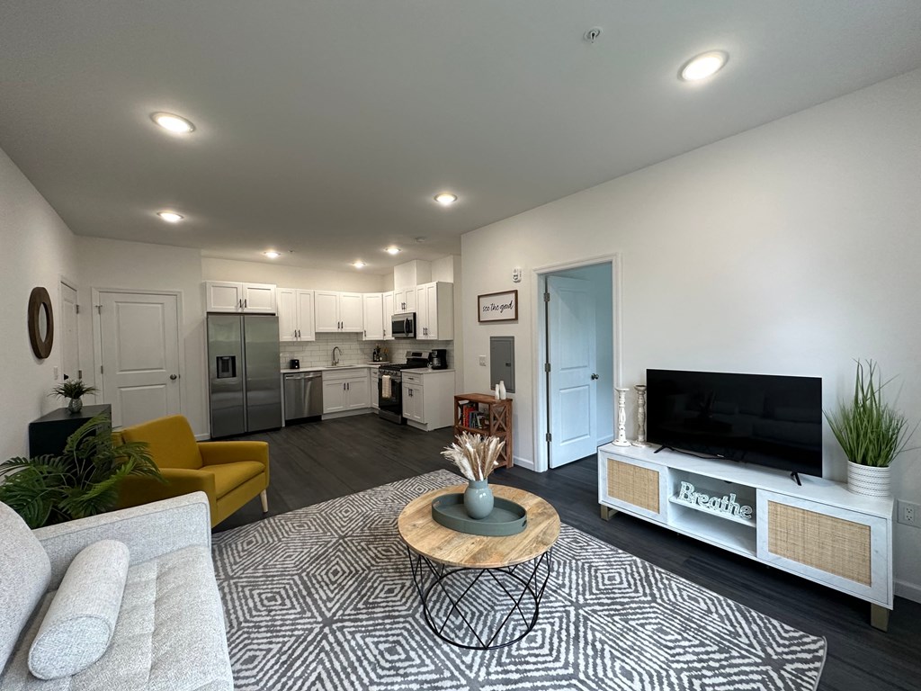 a living room with a couch and a tv