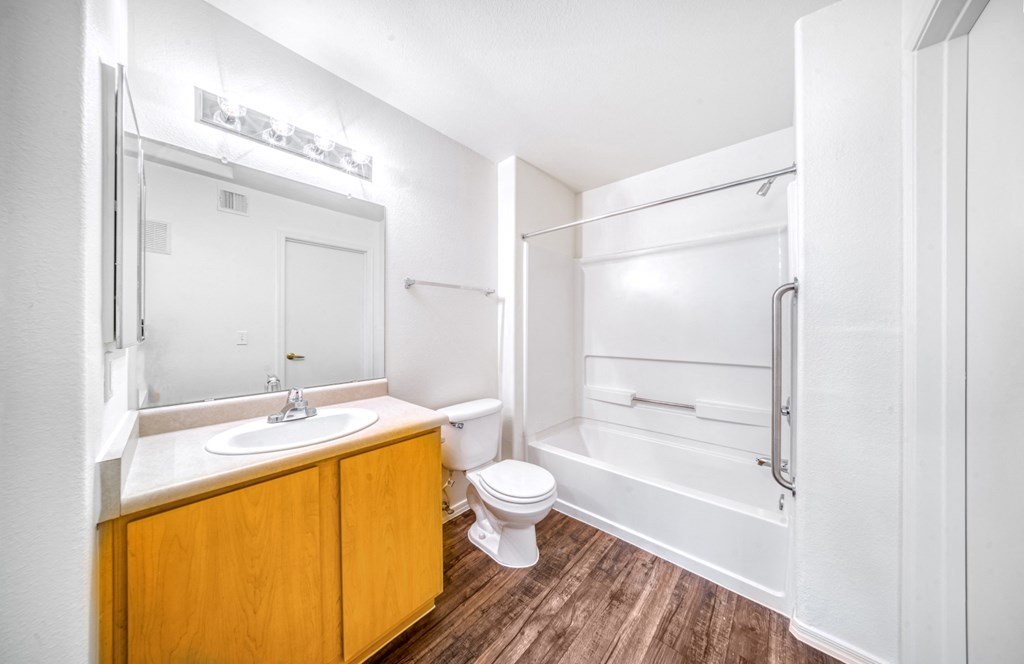 a bathroom with a sink toilet and a shower