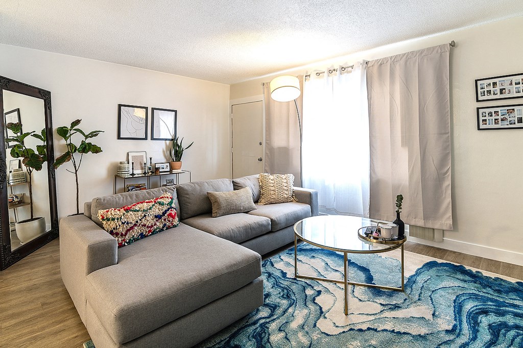 a living room with a couch and a coffee table