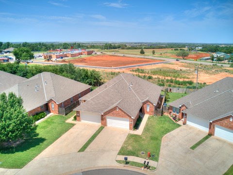 an aerial view of a group of houses in a neighborhood
