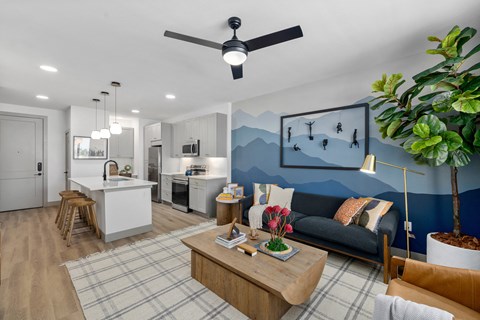 a living room with a couch and a table