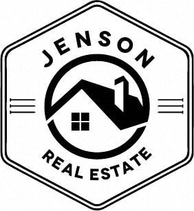 a real estate sign with a house in a circle