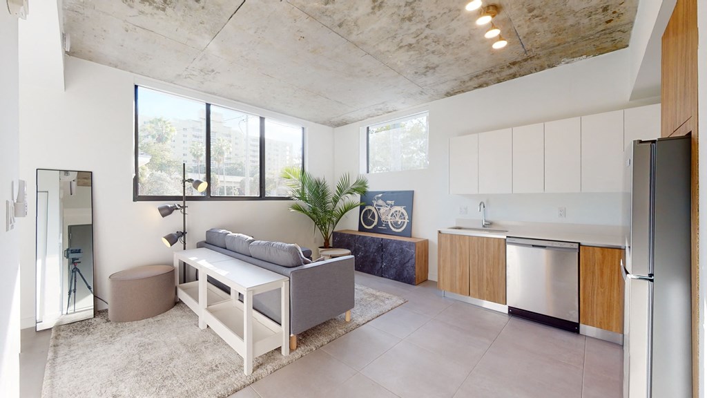 a living room with a couch and a table