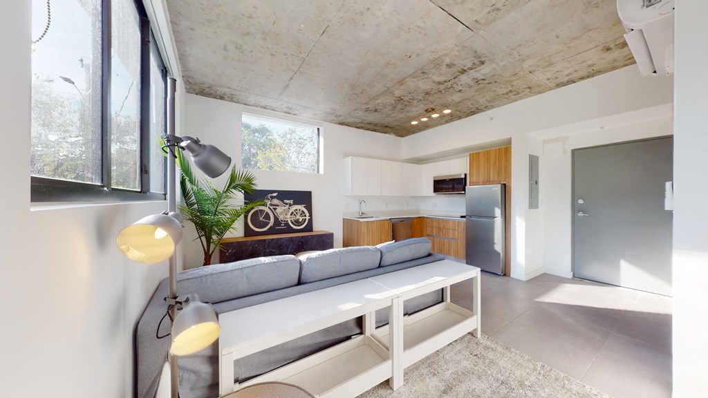 a living room with a couch and a table