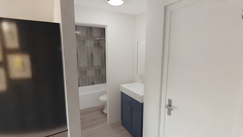 a small bathroom with a toilet and a sink and a mirror