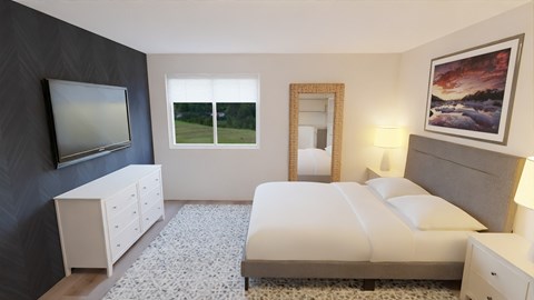 a bedroom with a bed and a television