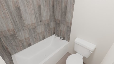 a bathroom with a toilet and a bath tub