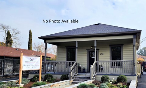 A house with a sign that says "No Photo Available" in front of it.
