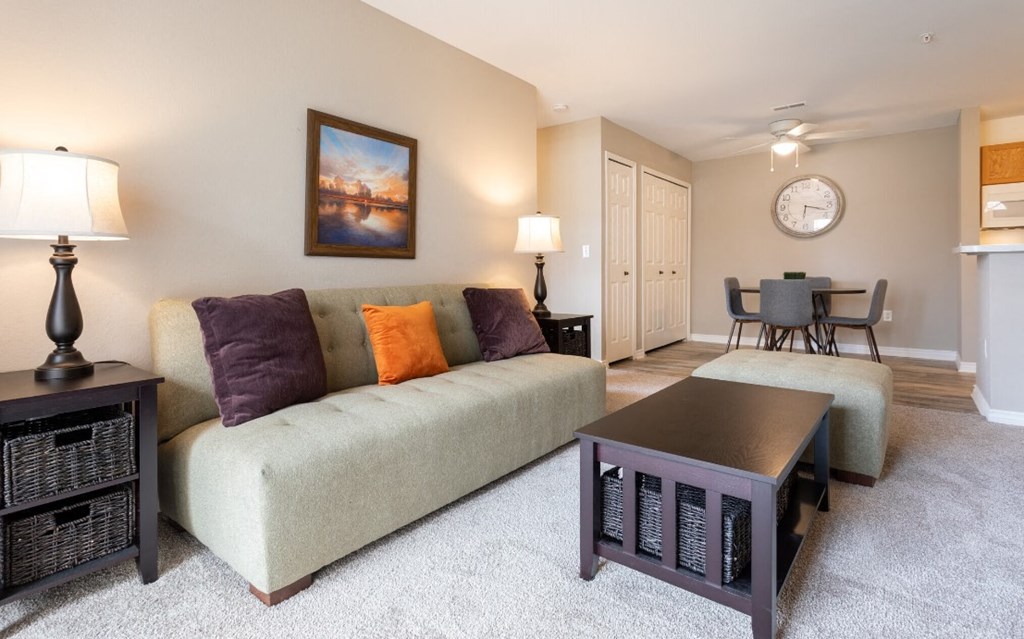 a living room with a couch and a table