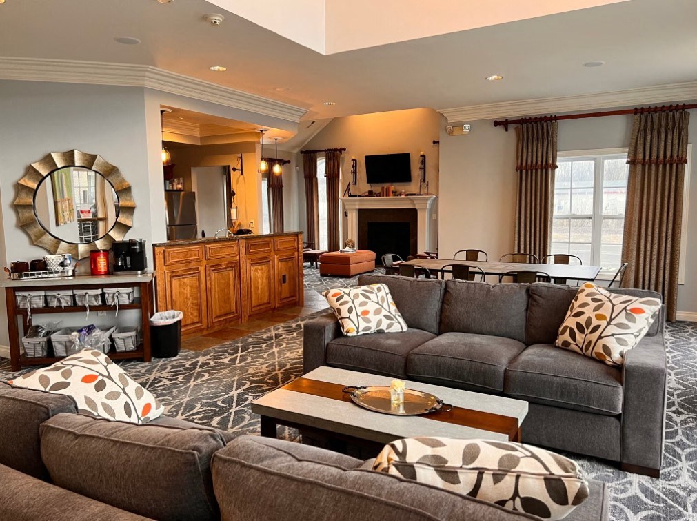 a living room with couches and a coffee table