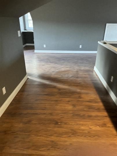 a living room with a hard wood floor