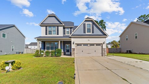 a house with a garage and a driveway