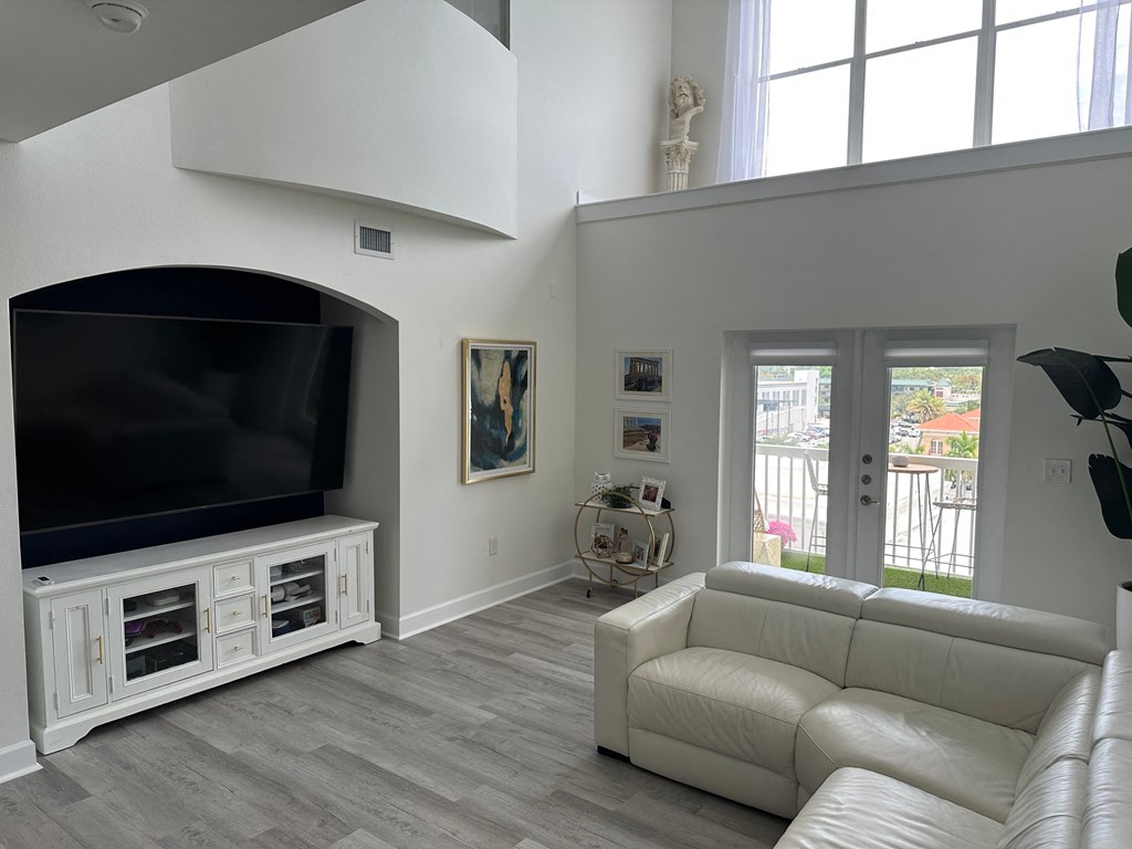 a living room with a couch and a television
