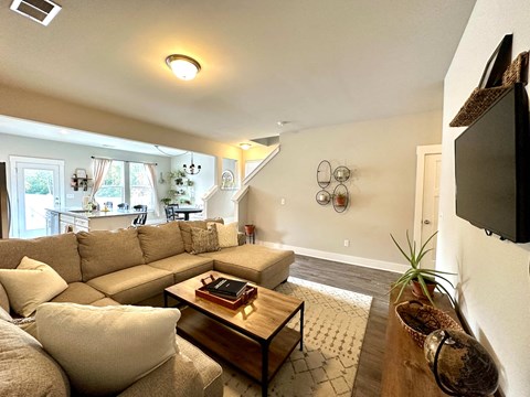 a living room with a couch and a coffee table