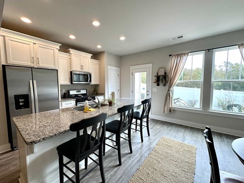 a kitchen with a granite counter top
