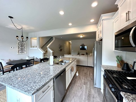 a kitchen with a counter top and a sink