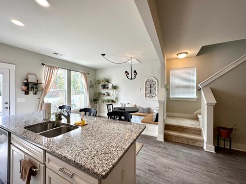 a kitchen with a sink and a counter top