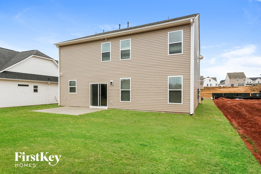a house with a yard in front of it