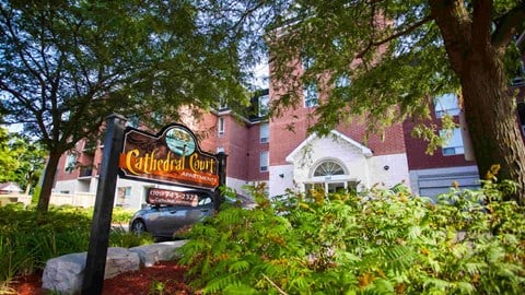 a sign is in front of a building