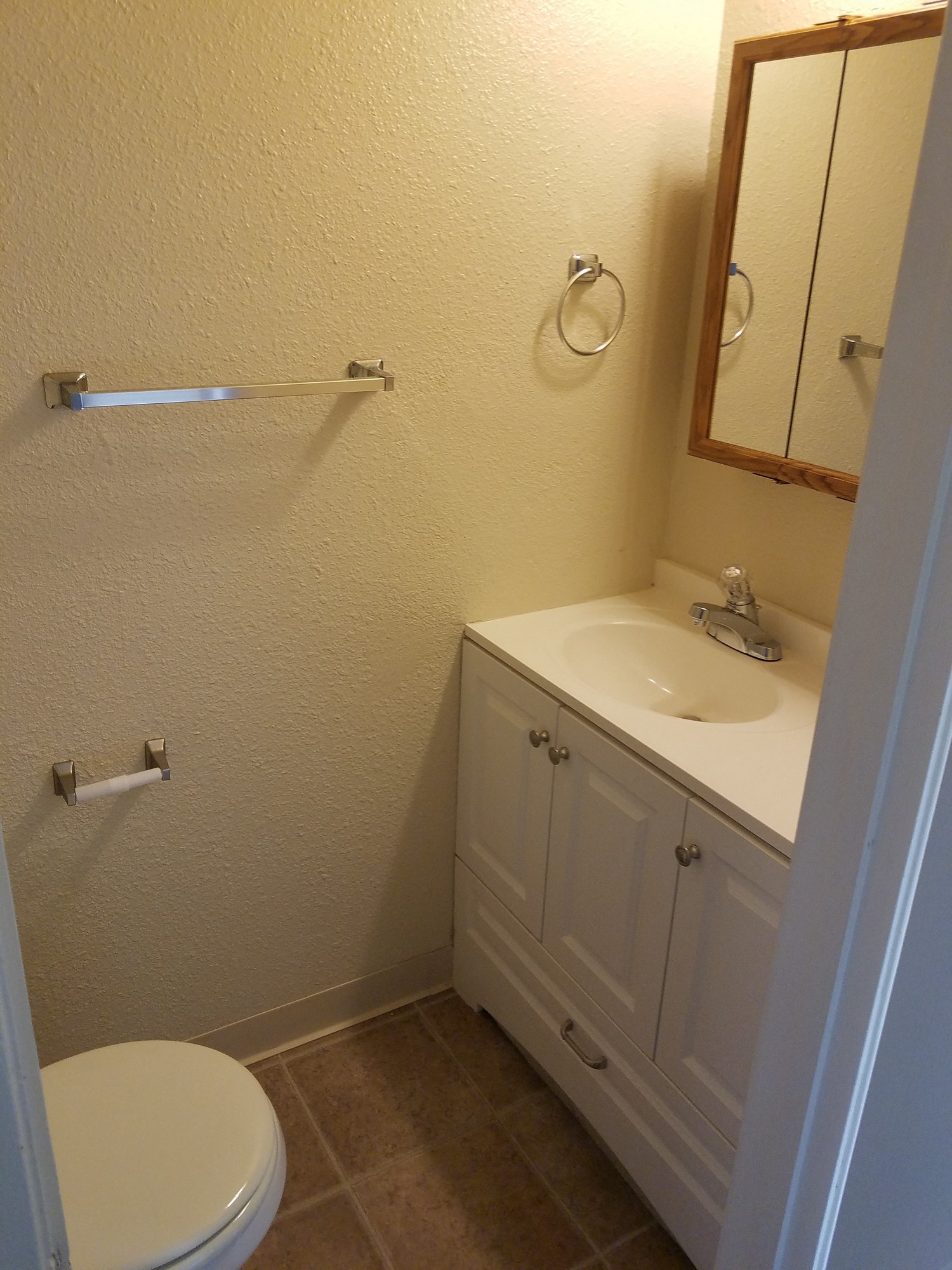 bathroom photo of sink and mirror