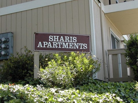 Exterior building photo of Monument sign Sharis Apartment Sign photo