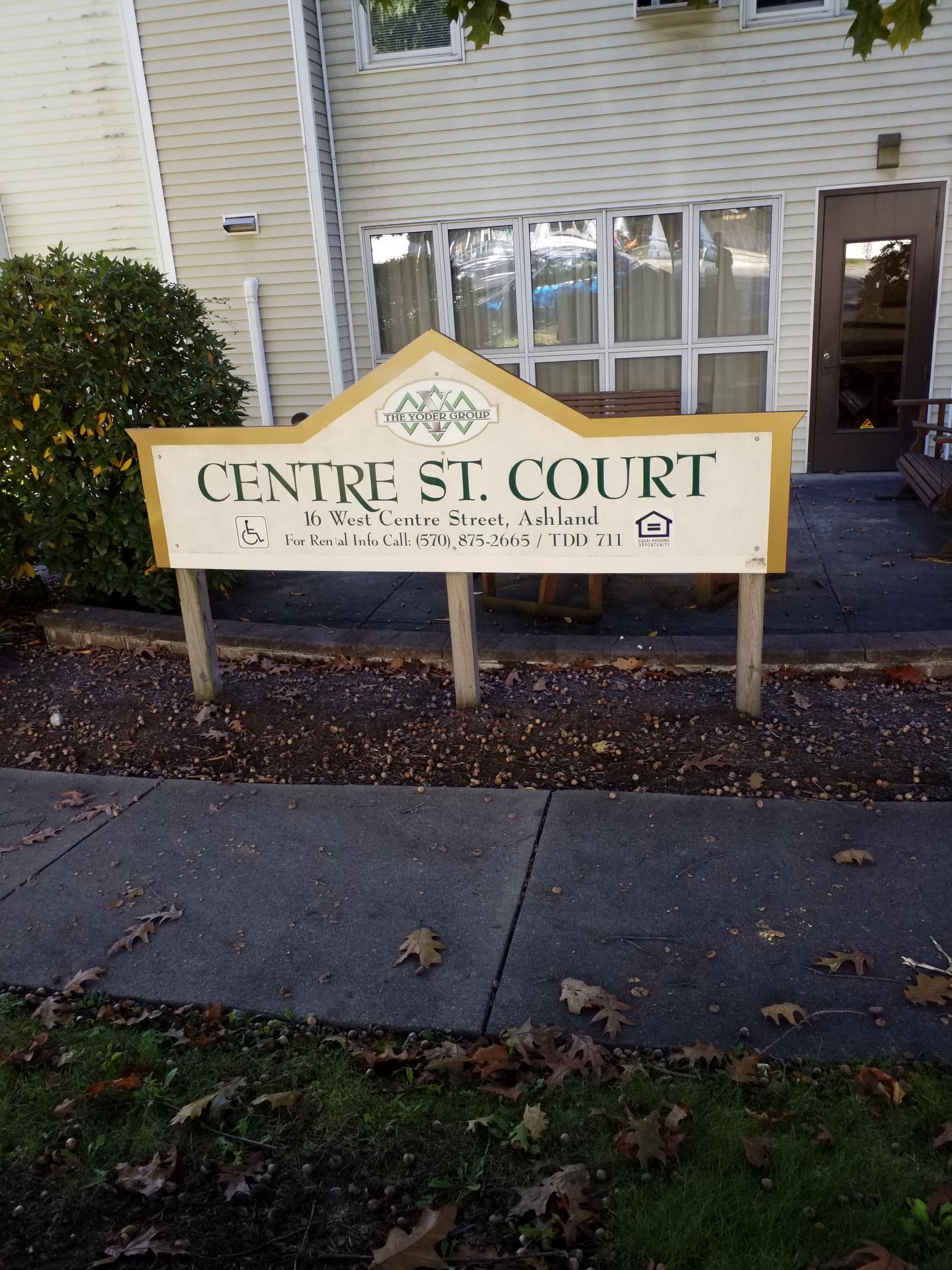 the sign in front of the center court building