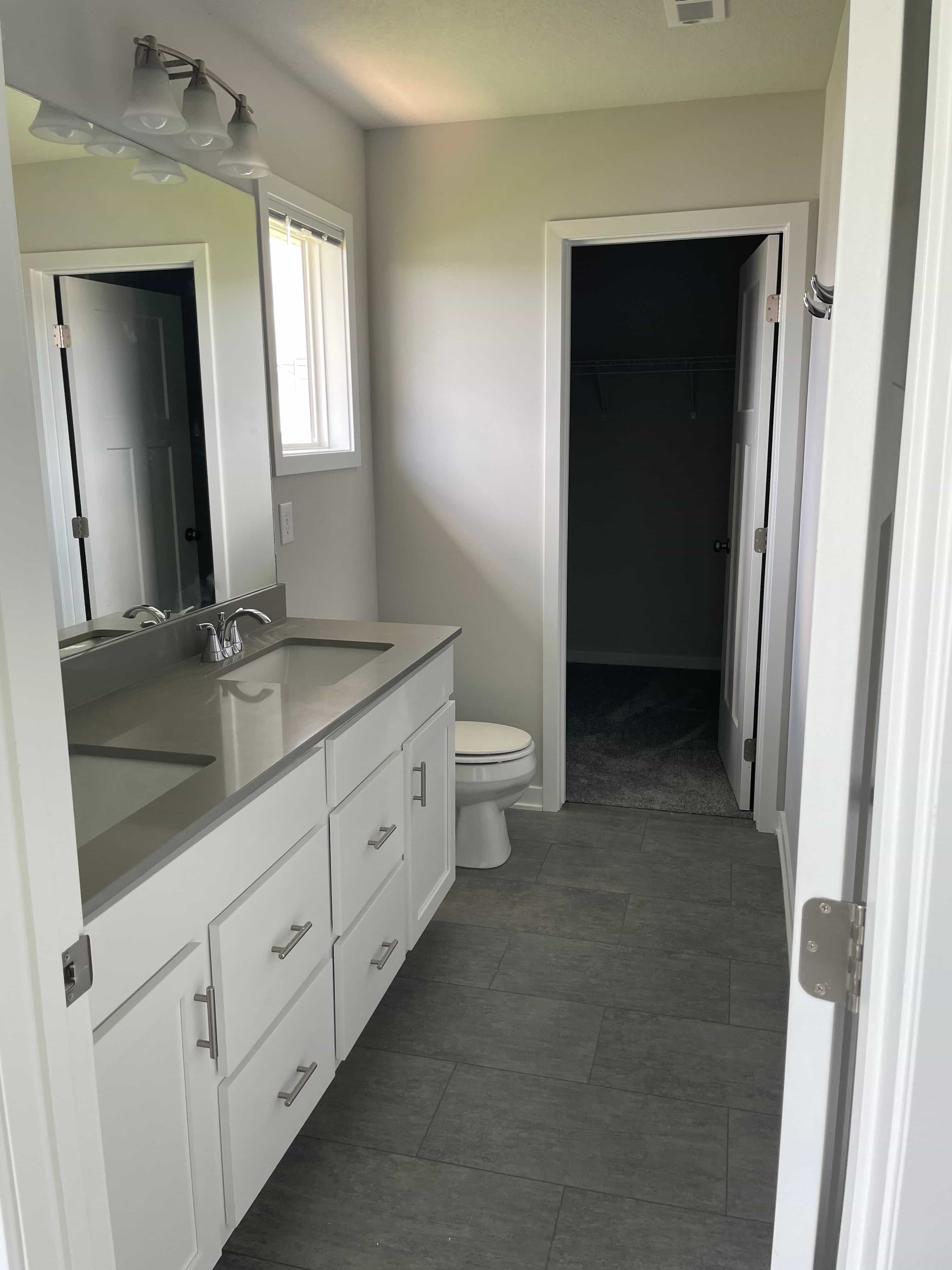 a bathroom with a sink and a toilet