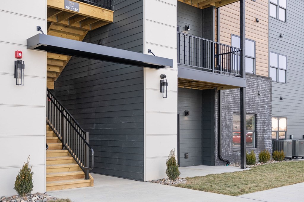 a view of the exterior of a building with stairs