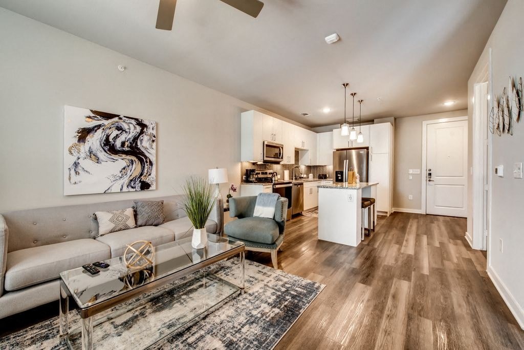 a living room with a couch and a table
